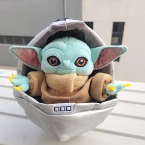 Peluche Yoda bebé en su cuna Peluche Disney Peluche Star Wars Tamaño: 23cm