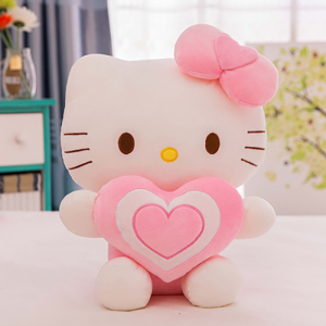 Peluche de Hello Kitty con un corazón sentado sobre una mesa